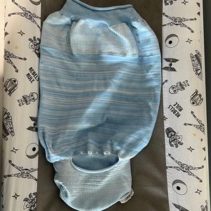 Gently used (2 washes) blue hand knit swaddelini.